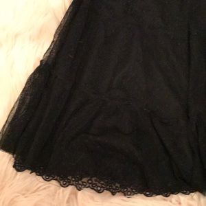 Donating Small black lace skirt. 21” long